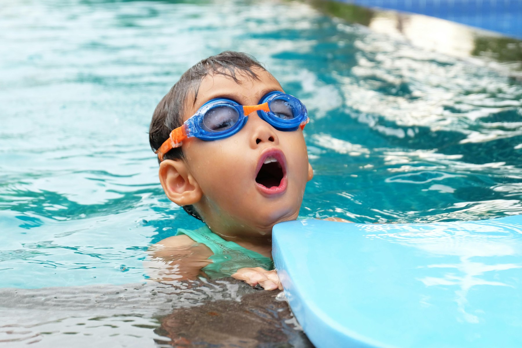Child learning swimming